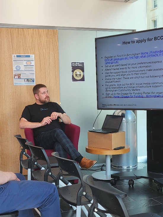 Image of Emil Prysak presenting on how to apply for funding from BCC