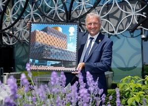 Stamp of the Library of Birmingham held by the Deputy Leader, Cllr Ian Ward